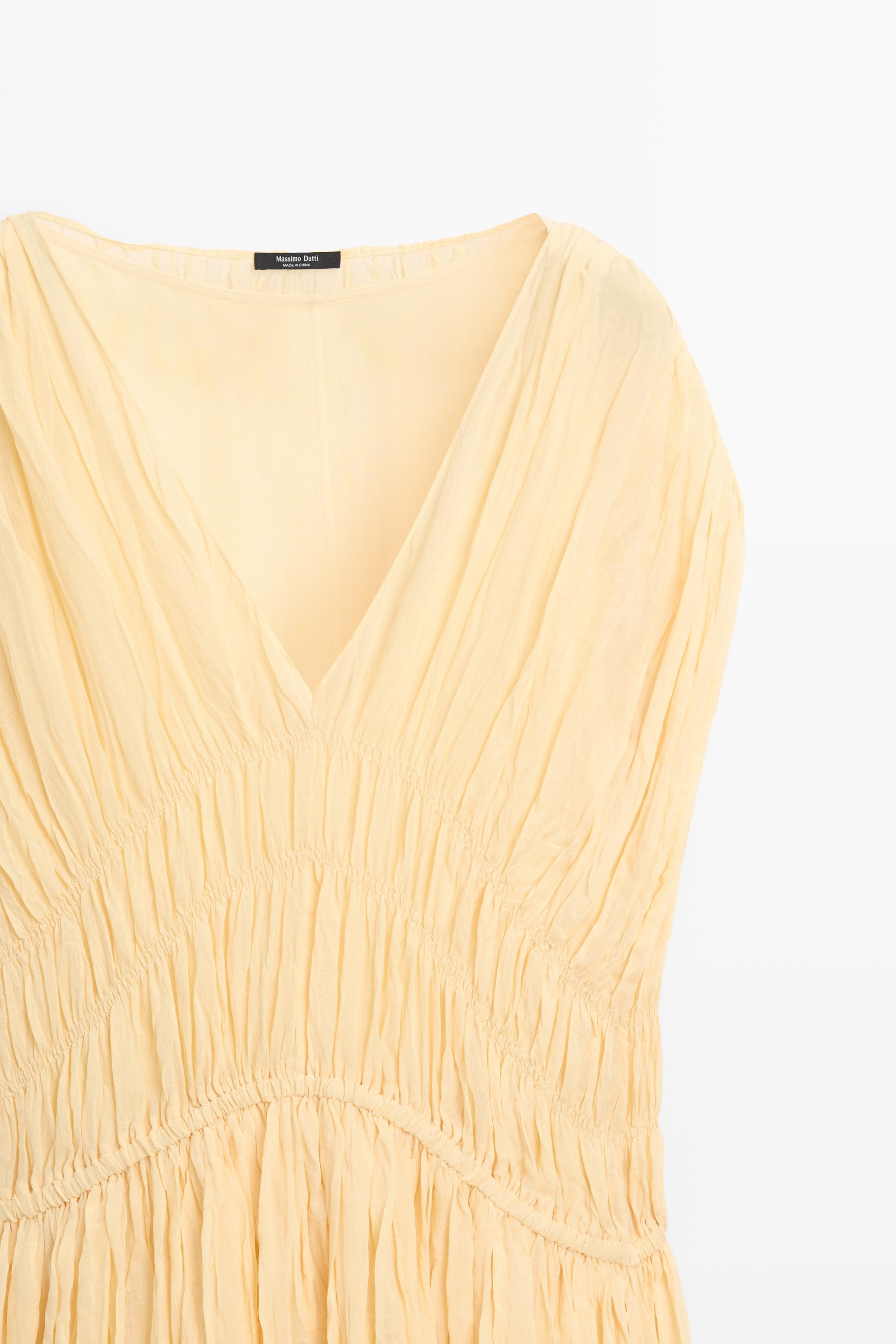 Robe midi fluide froncée